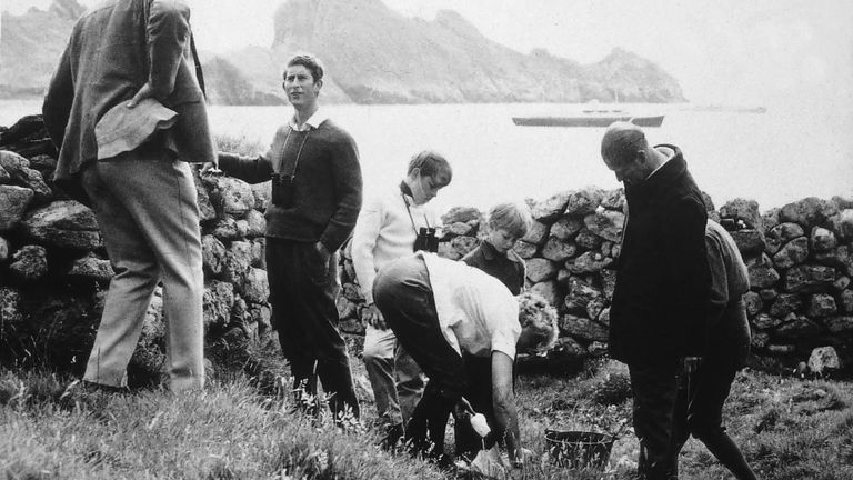 Undated handout photo issued by the National Trust for Scotland of the Prince of Wales (2nd left) on St Kilda in 1971, he has replied to a postcard, which was written to him by NTS Western Isles manager Susan Bain in letters posted in 2010 in a small handcrafted mailboat to mark 80 years since the evacuation of the remote islands and have been found by children in Norway.