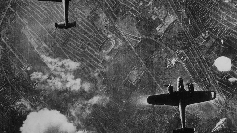 Two Luftwaffe Dornier 217 bombers flying over the Silvertown area of London&#39;s Docklands on 7th September 1940 at the beginning of the Blitz on London. Fires have started near the Beckton Gasworks. West Ham greyhound track is near the centre of the picture, which was taken from a German bomber. (Photo by Central Press/Hulton Archive/Getty Images)
