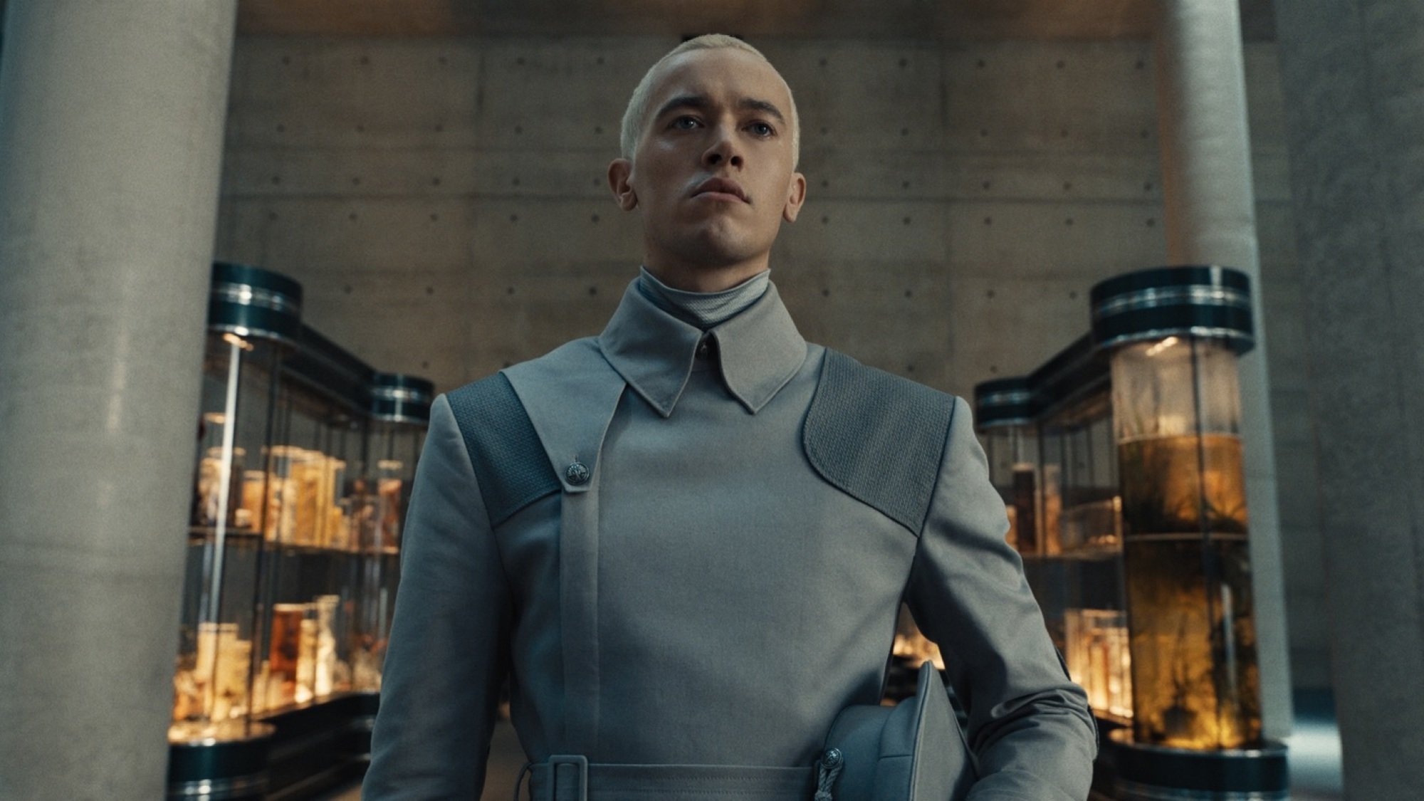 A man in a grey Peacekeeper uniform.