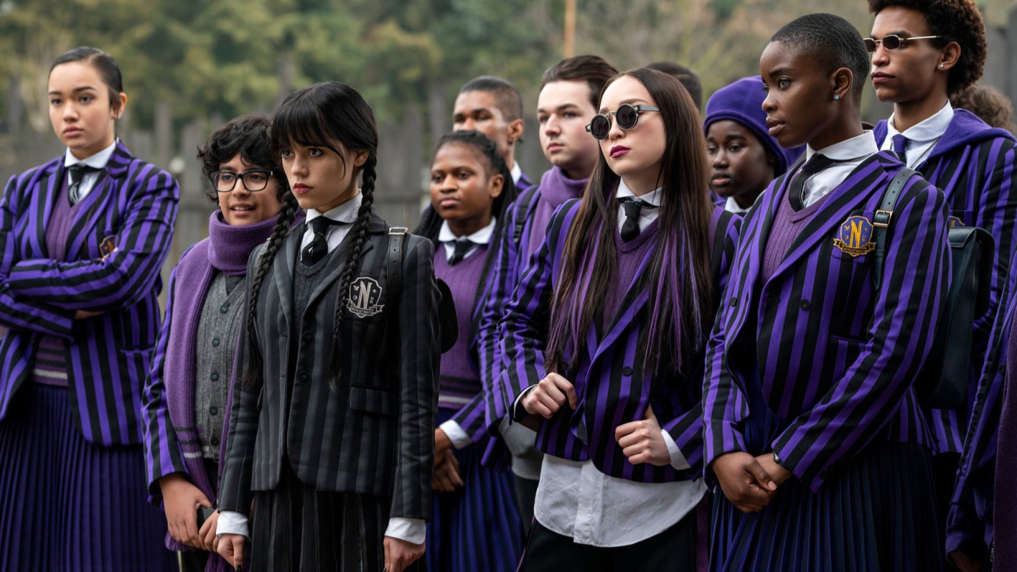 A group of students in pinstriped uniforms.