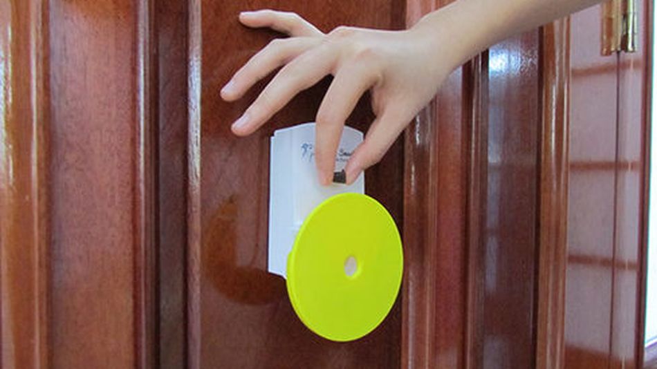 The Pebble Smart Doggie Doorbell has a built-in treat dispenser for easy training.