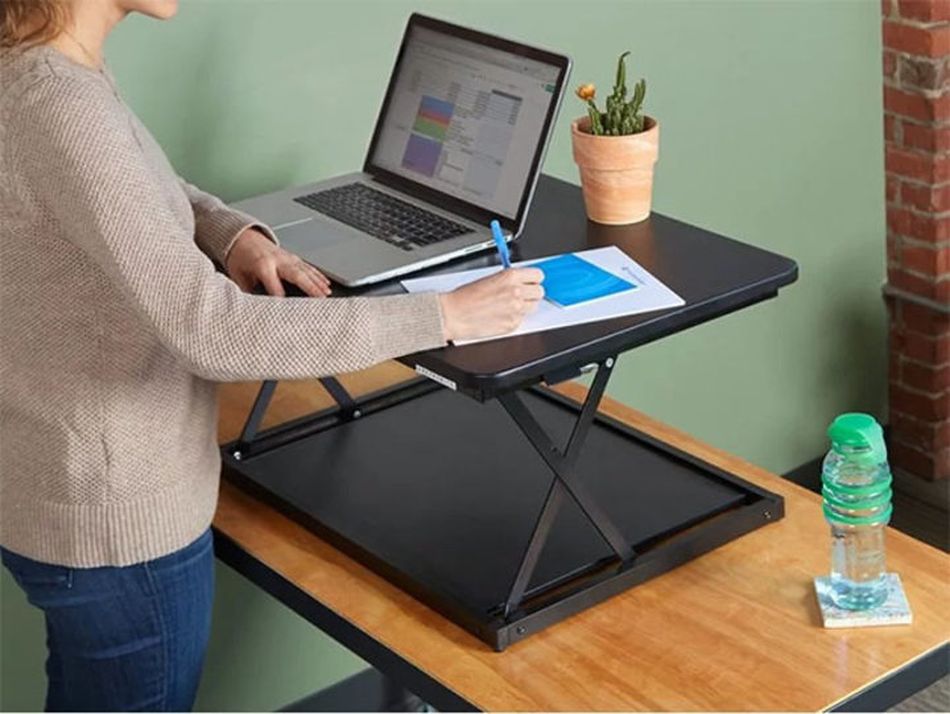 Mend your mangled spine: Standing desks and laptop stands are on sale