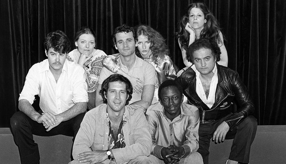 The original SNL cast: Dan Aykroyd, Jane Curtian, Chevy Chase, Bill Murray, Laraine Newman, Garrett Morris, Gilda Radner, and John Belushi.