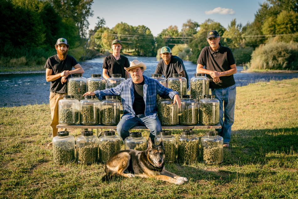 Belushi with his farm crew and product. Cousin Chris is standing at the right.