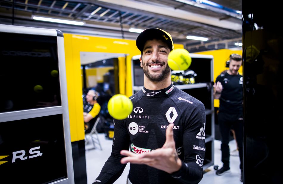 Daniel Ricciardo juggles tennis balls with an infectious smile.