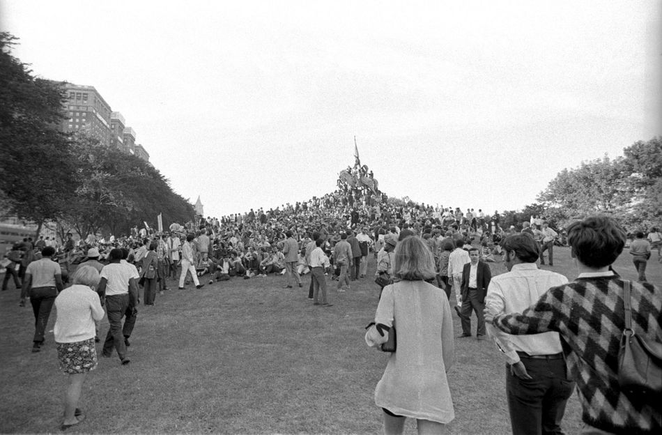 Protesters gather around the statue of General John Logan in Chicago's Grant Park during the 1968 protests around the Democratic National Convention.