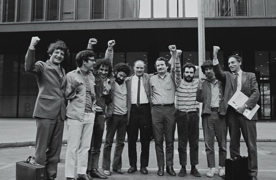 The Chicago 7 with their lawyers. From left, lawyer Leonard Weinglass, Rennie Davis, Abbie Hoffman, Lee Weiner, David Dellinger, John Froines, Jerry Rubin, Tom Hayden, and lawyer William Kunstler.
